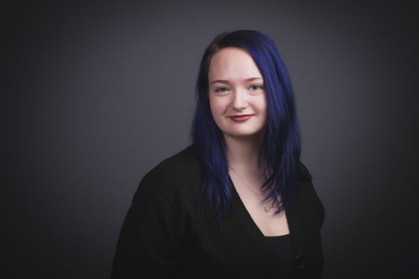 photo of Livia with a black back drop